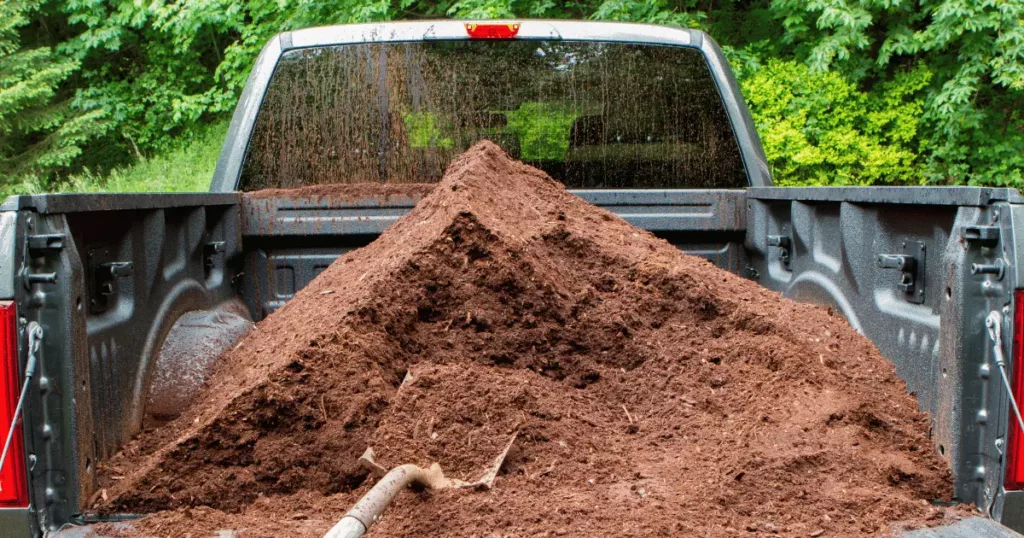 bulk mulch in a pickup truck