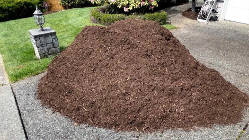 a pile of bark mulch that has just been delivered